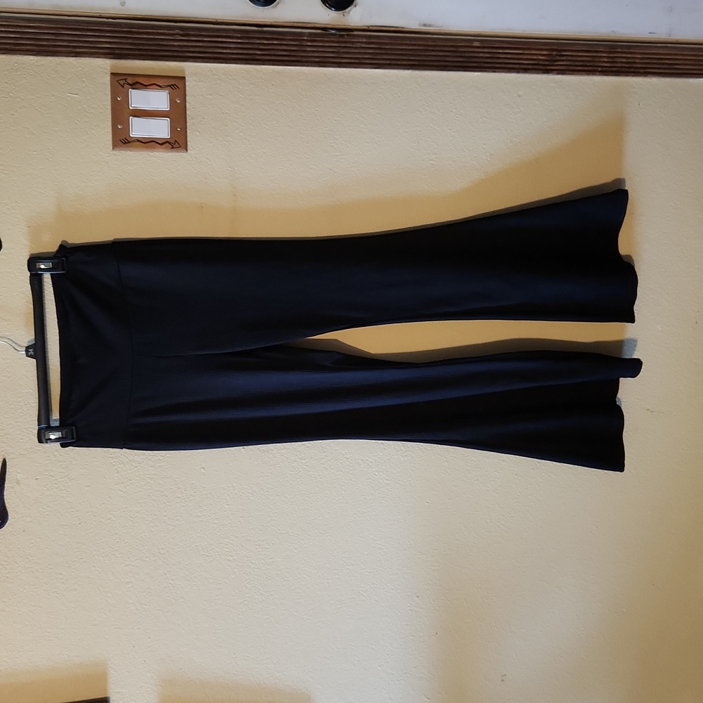 Black, belled leg,  stretch leggings.